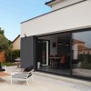 MAISON CONTEMPORAINE à LA BAULE AVEC PAREMENT PIERRE ET ENDUIT BI-COLOR, VERRIERE INTERIEURE ET ESCALIER METAL ET BOIS