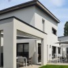 MAISON CONTEMPORAINE DESIGN A LA BAULE PATIO EXTERIEUR ET ESPACE DE VIE SPACIEUX ET LUMINEUX AVEC ESCALIER A LIMON CENTRAL